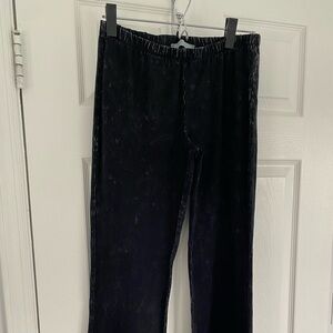 Black bell bottom pants, perfect for 70’s theme party